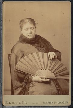 Photograph of HP Blavatsky holding a fan, 1887. Harvard Divinty School Library, bMS 516.