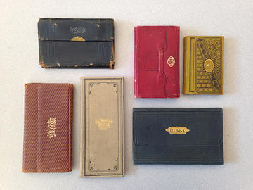 An array of colorful diaries kept by Universalist missionary, Quillen Shinn (bMS 510/1)