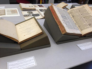 Photograph of rare books and archival collections displayed for a class visit